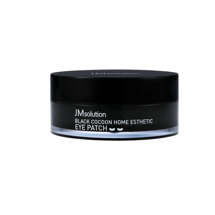 Jar of JMsolution Black Cocoon Home Esthetic Eye Patch with spatula.