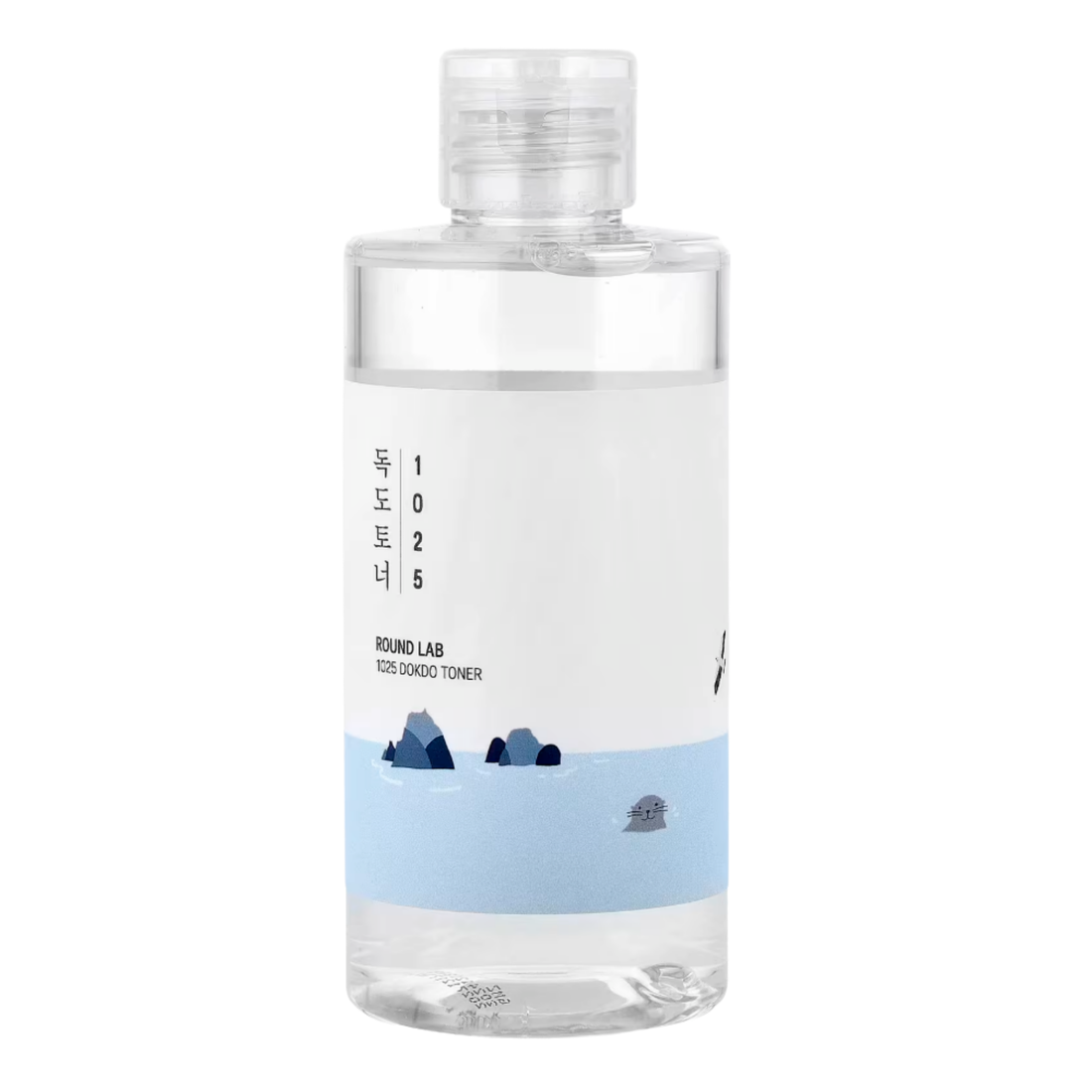 Clear bottle of Round Lab toner with a label on a white background
