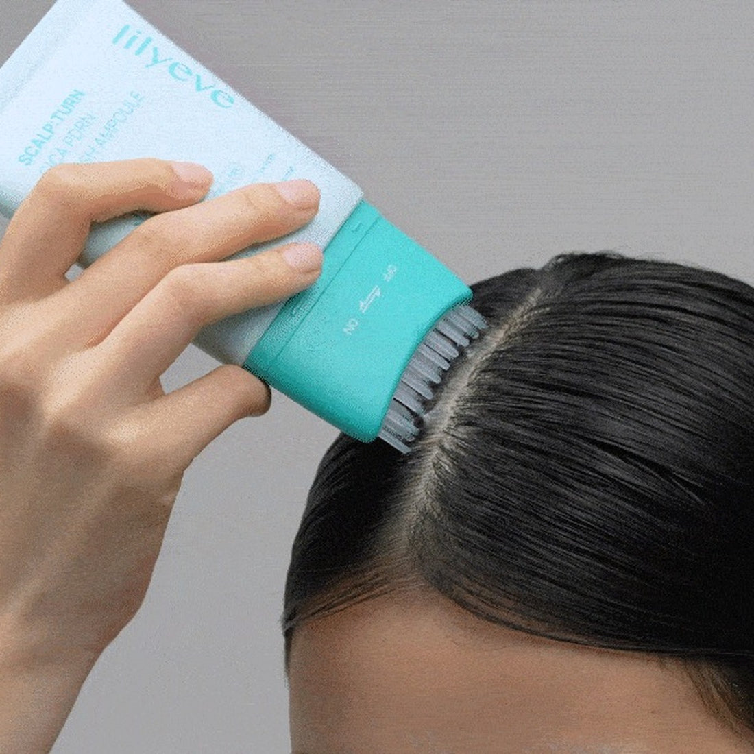 Applying SCALP:TURN along the parting with the brush head